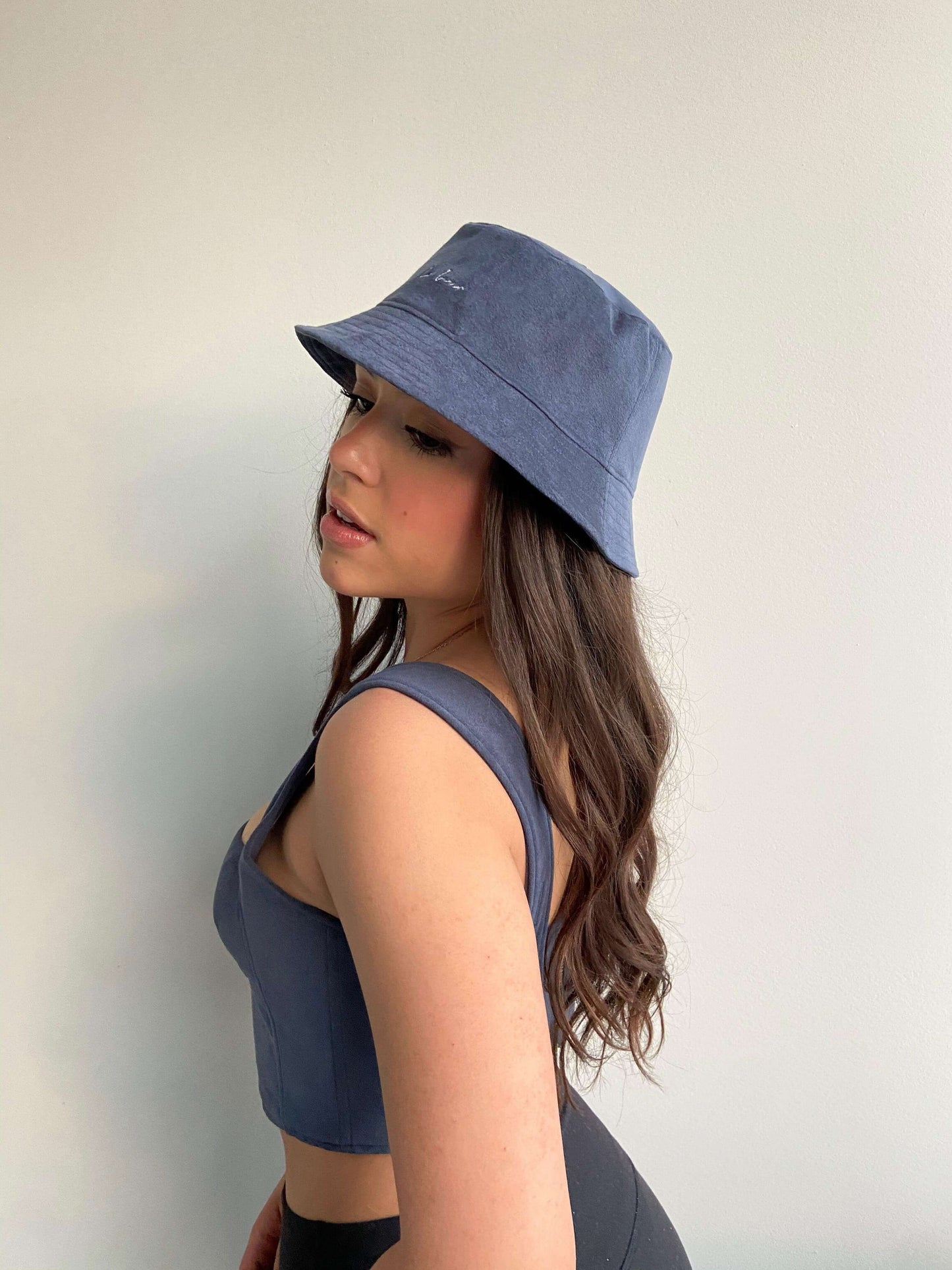 Model 2 wearing Classic Bucket Hat in Blueberry colour with Mimi Bustier in Blueberry colour